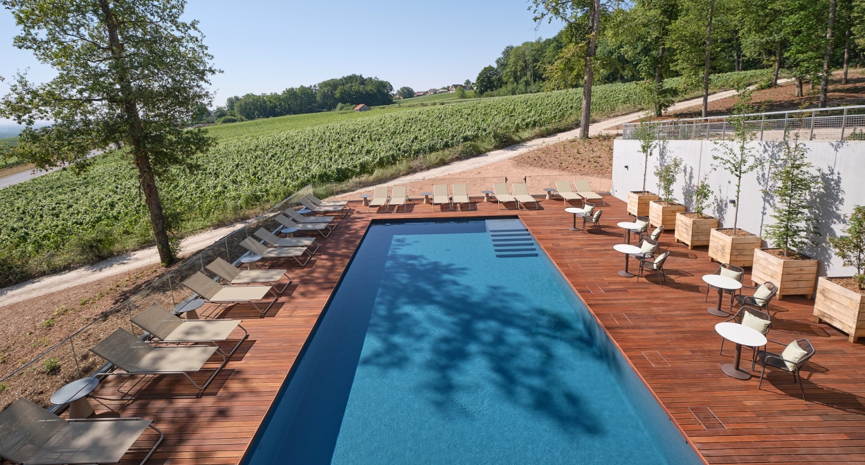 Outdoor heated swimming pool in France @ALEXANDRE COUVREUX